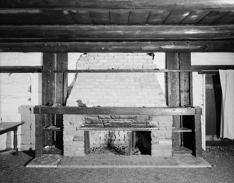 DETAIL OF FIREPLACE LOCATED IN CENTRAL ROOM; CAMERA FACING SOUTH