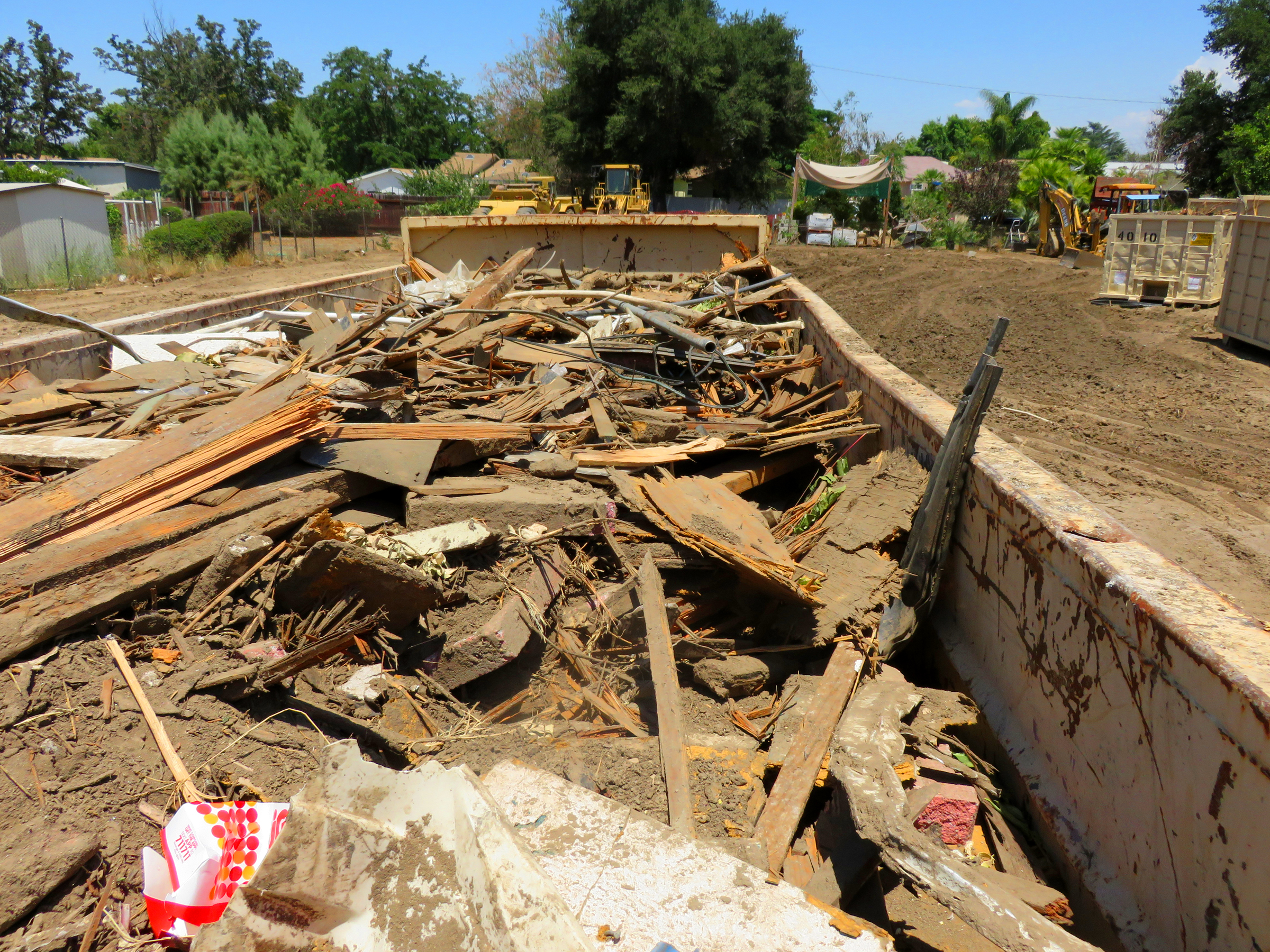 All that's left of the 3rd Newhall School building (ca. 1913-1928) is in some roll-off bins.