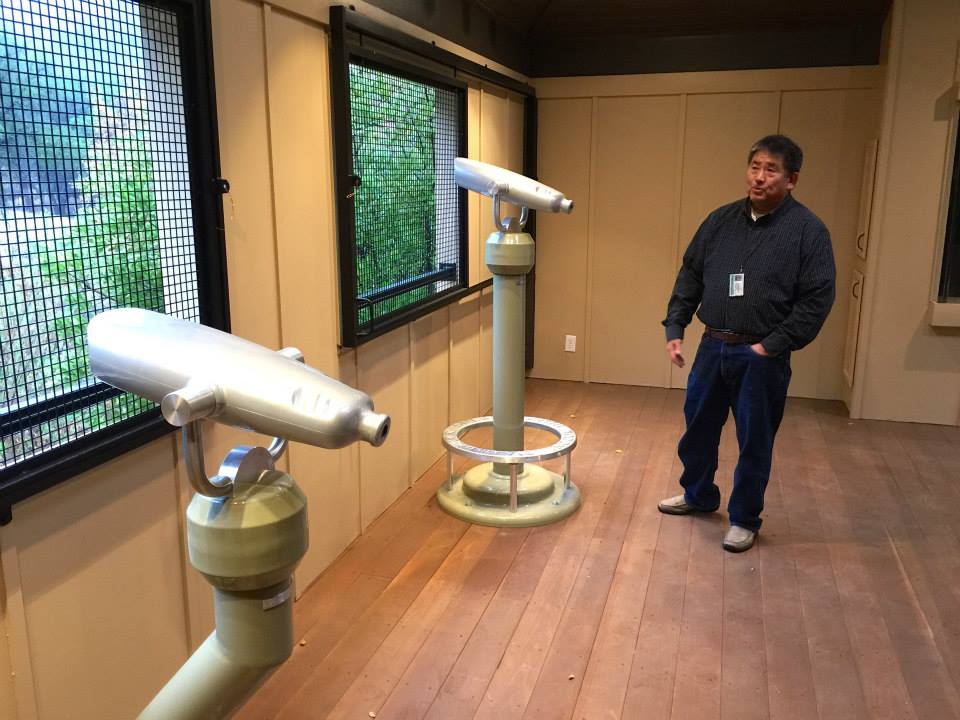 Park Supervisor Russ Kimura with new telescopes in the refurbished observation deck. Photo: Ron Kraus.